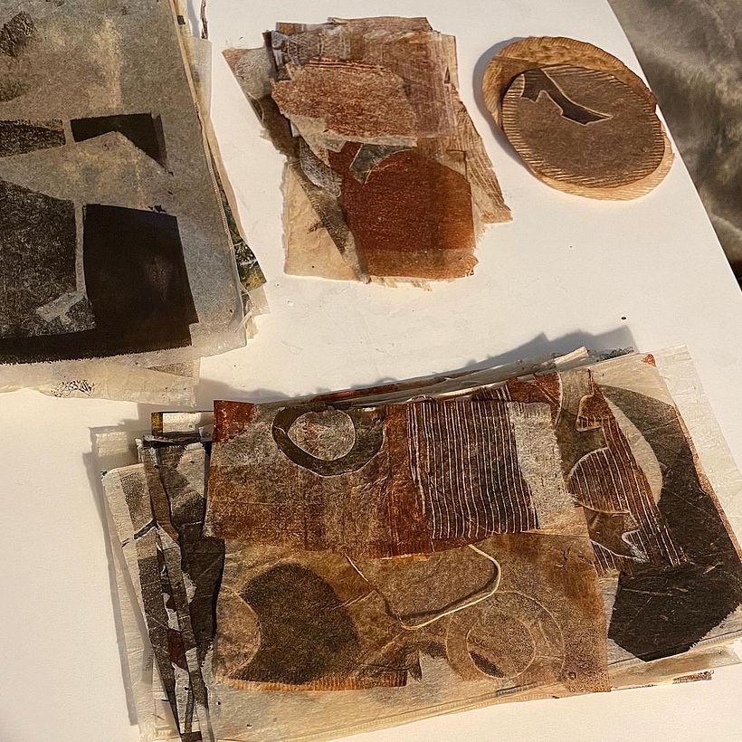 Monoprinting, a printmaking technique, is one way to add designs to the used tea bags