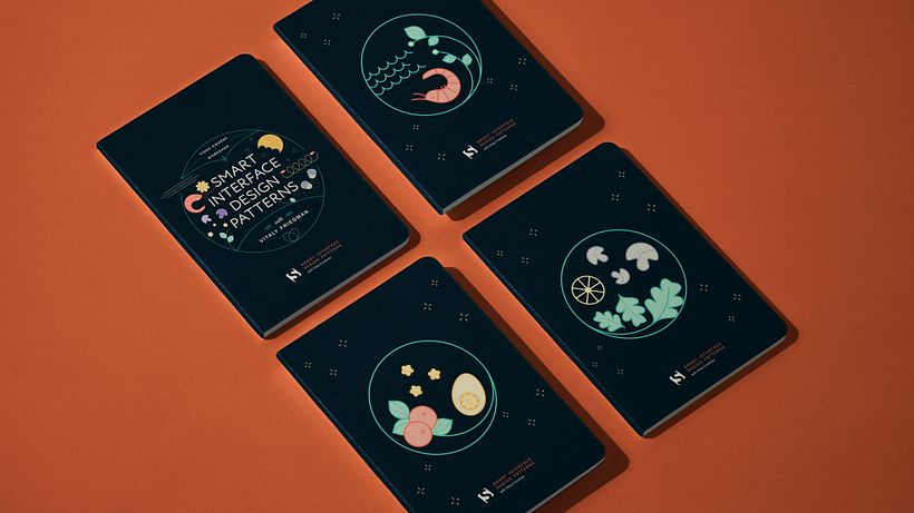 Notebooks featuring the illustrations of Smart Interface Design Patterns