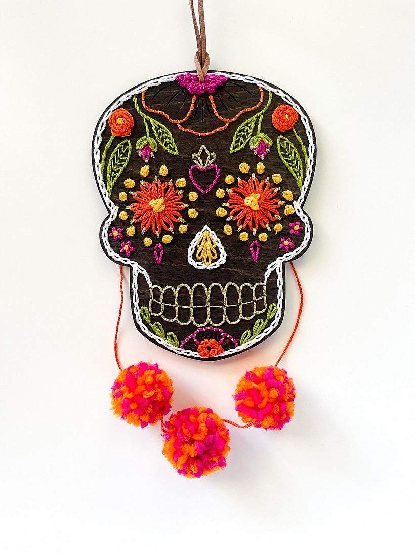 Pompoms can be added and placed in creative ways.