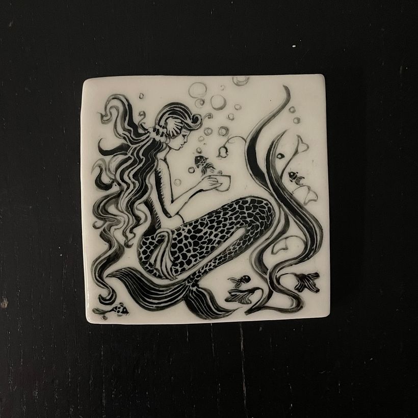The final fired piece, fired to 1200 degrees. Amaco jet black underglaze, on keanes lumina porcelain