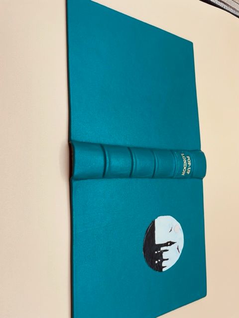 I used a green goat skin for the book cover. I added the raised bands on the spine. 