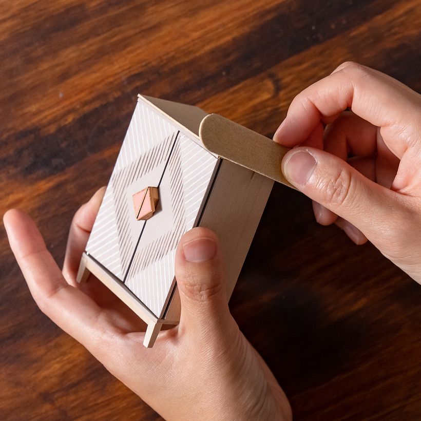Doing some sanding on the cabinet.