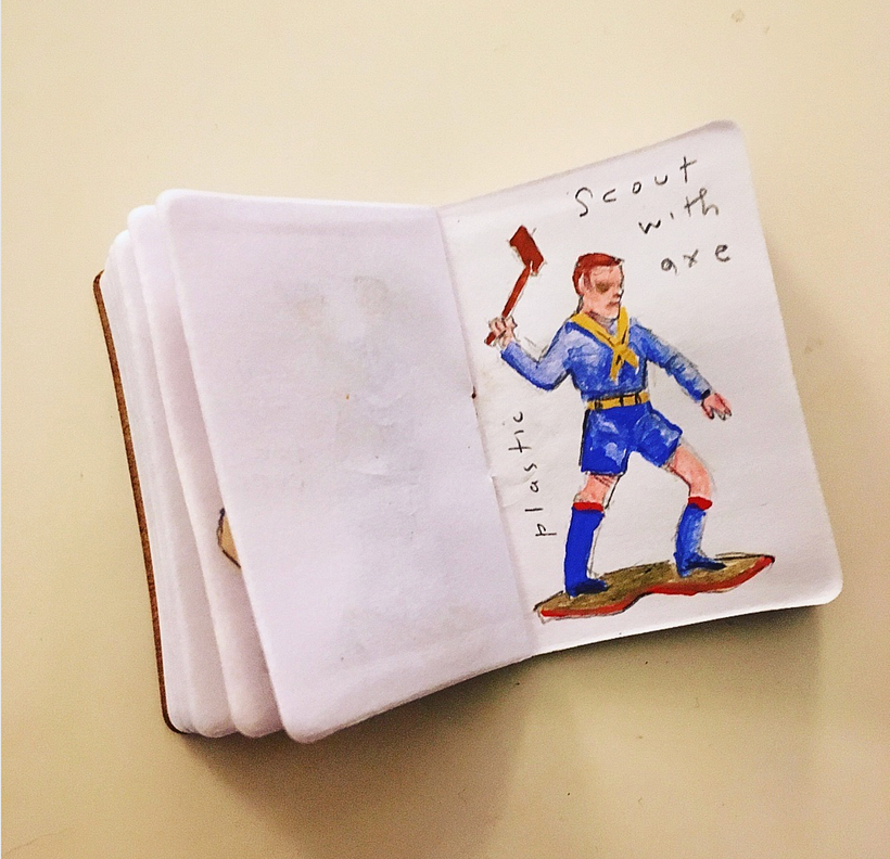 Plastic scout with axe