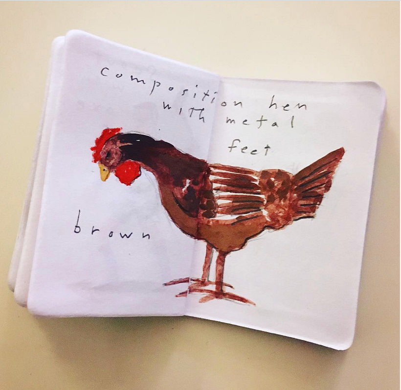 Brown composition hen with metal feet