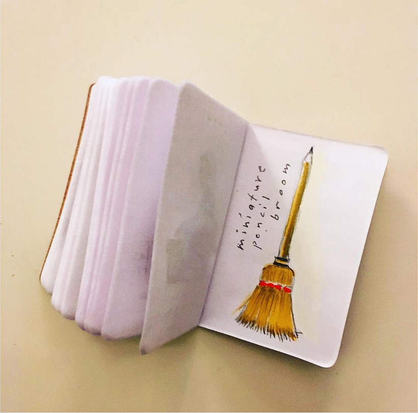 Miniature pencil that is a broom