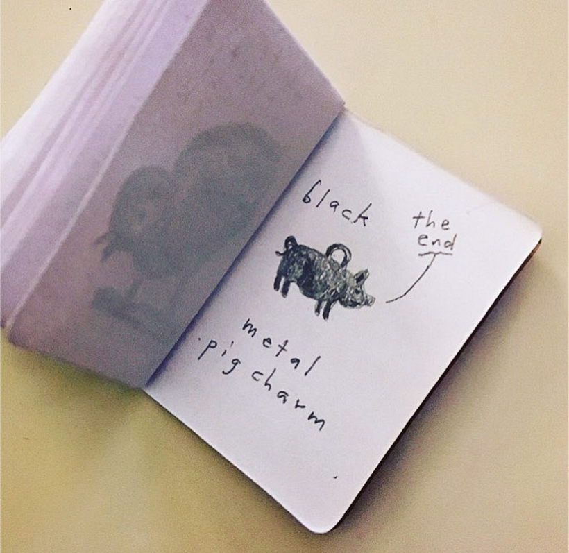 Black metal pig charm