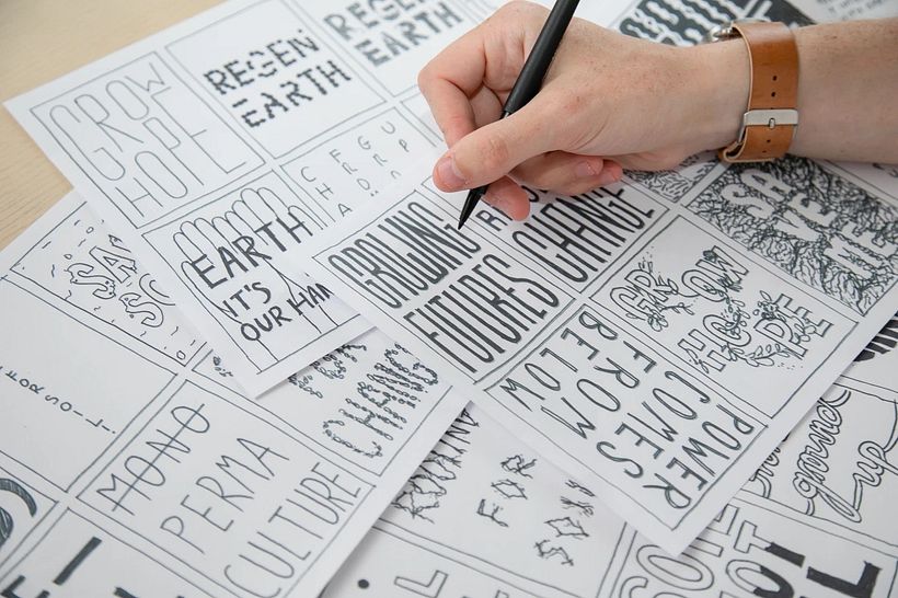 Graphic designer Nathan Smith working with different typographies.