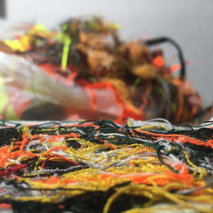 Detalle II-Proceso productivo, fieltro sobre hilachas en desuso.