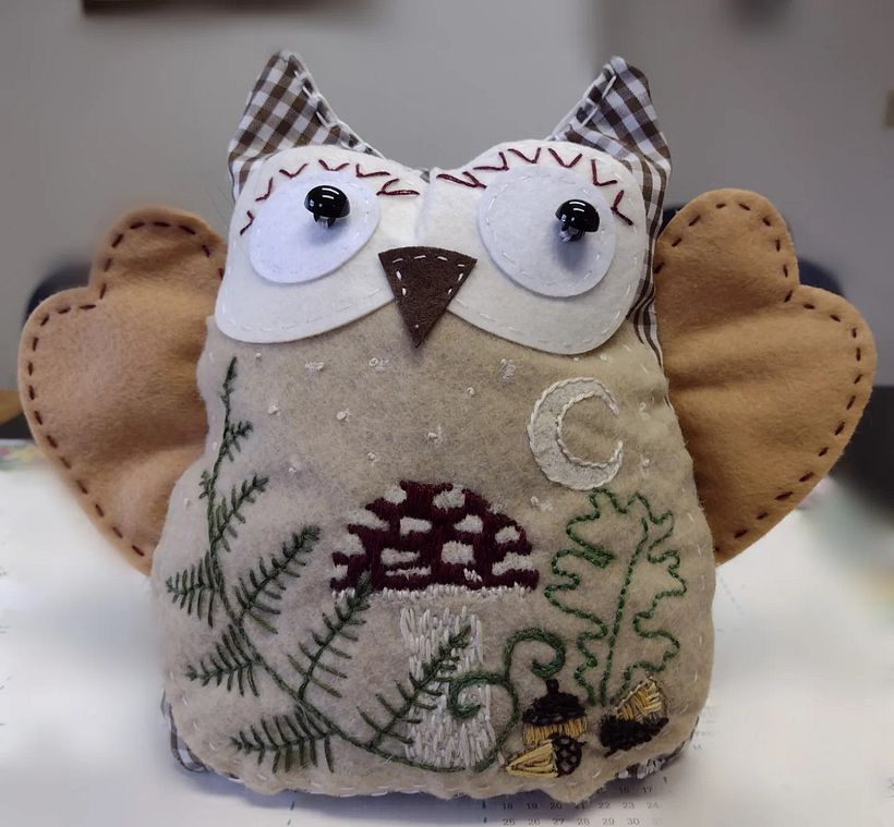 Mother-in-law's doorstop - embroidery designed by me and pattern drawn with poscas and accentuated with stitches