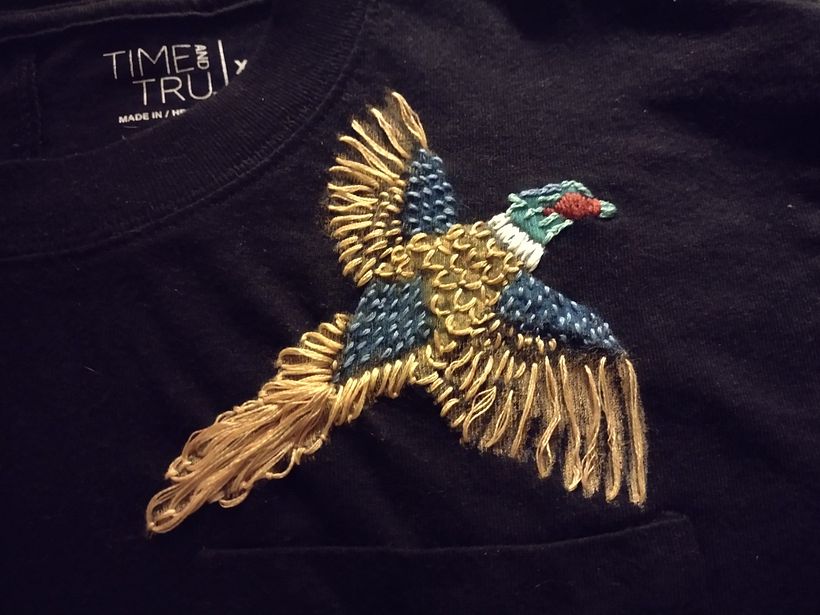 Final Product :) The tail feathers aren't as sharp as they should be but I like it aesthetically :)
