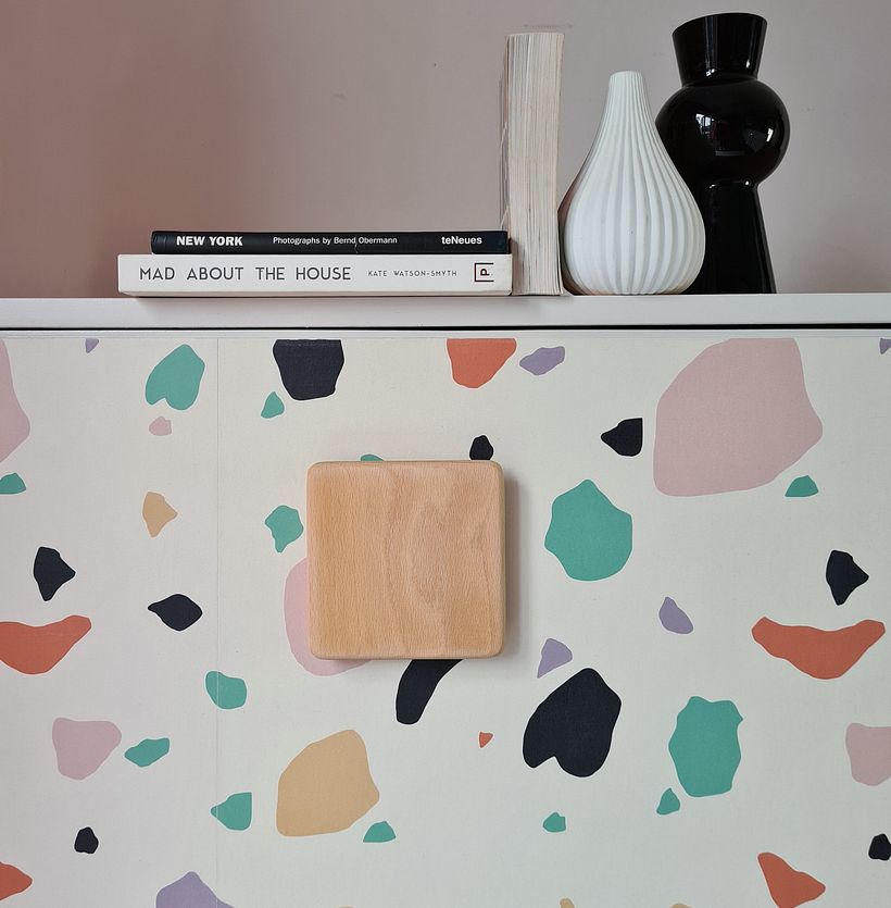 Asteroid Print by Lust Home decoupaged on Cabinet door