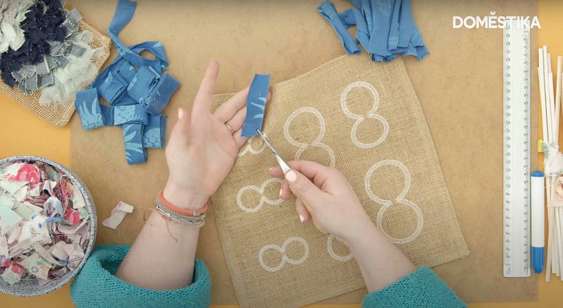 Use the rag rug spring tool to attach your fabric to the hessian.