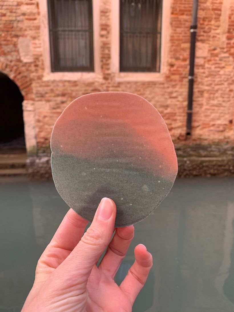 A thin chocolate disc, created to match the colours on Venice