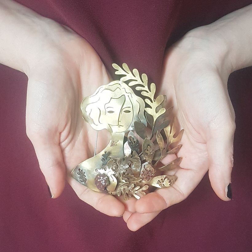 Delirante Fermento - Wearable Sculpture/Brooch. Brass, raw garnet, patina, fire oxidation, steel