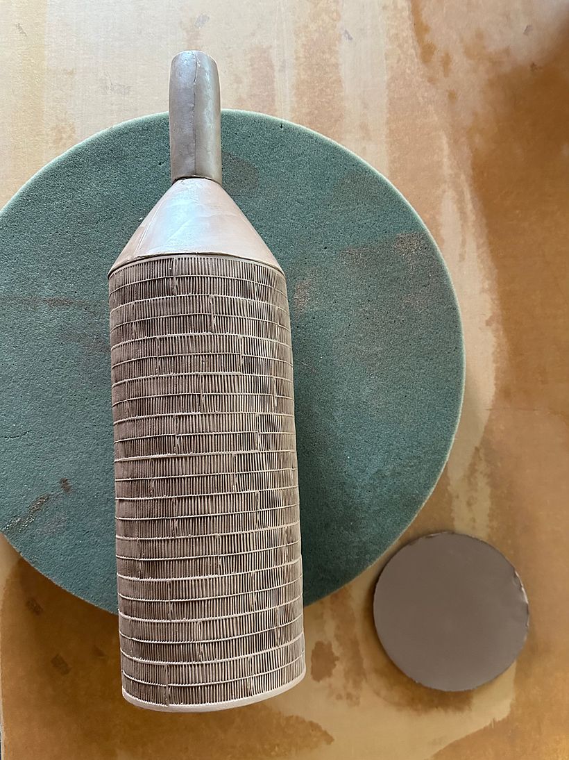 Bottle awaiting its bottom slab