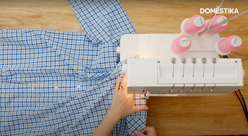 Neaten the raw edge of your fabric.