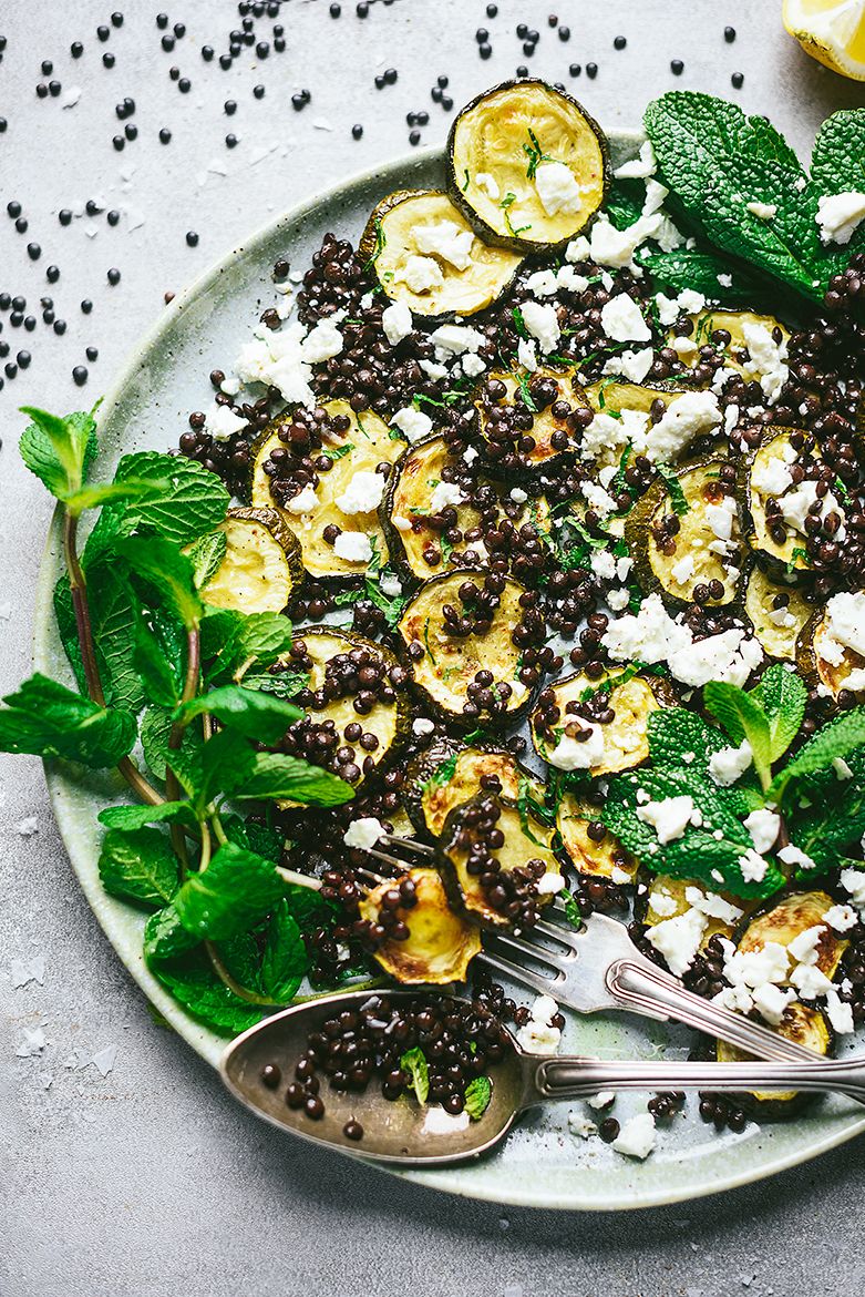 Salad of roasted zucchini and black lentils with feta cheese and mint