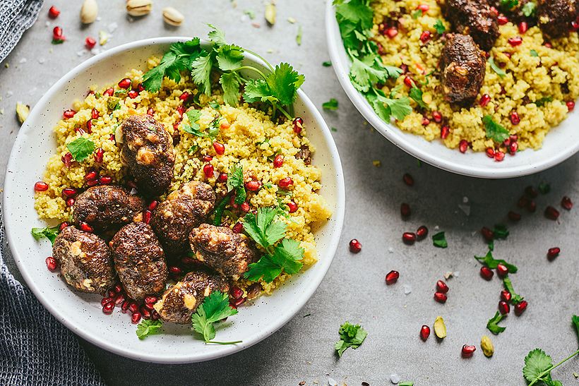 Jewelled couscous topped with beef and feta köfte