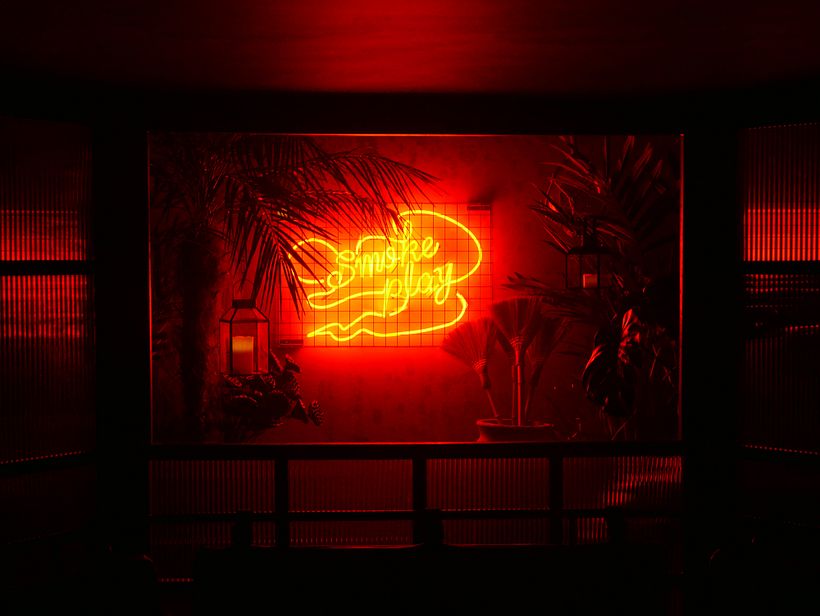 Khai Khai Smoke Play neon installation.