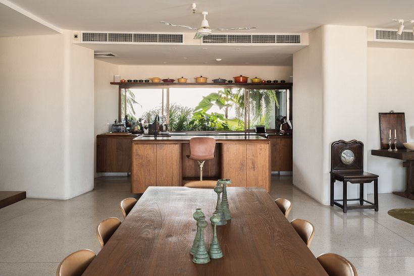 Kitchen aspect with tropical palms on the balcony