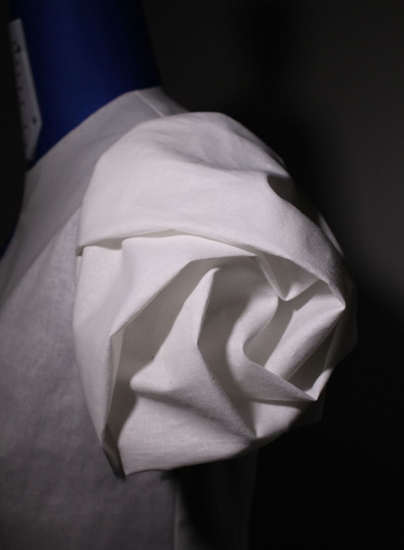 Rose sleeve using the smocking technique.