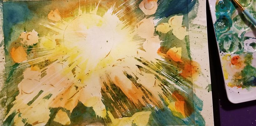 Infused bright sunlight after masking fluid removal with yellows and oranges while protecting center light.