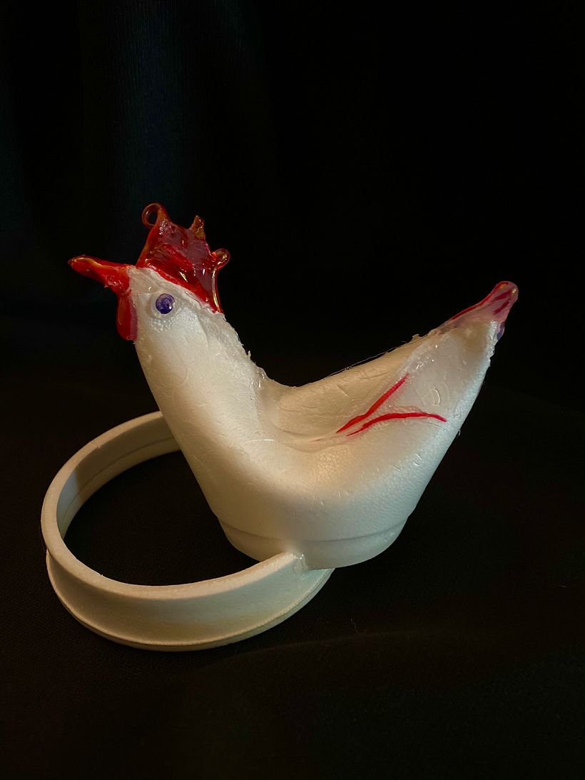 Hot glue gun used to melt and shape styrofoam.