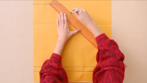 We continue to trace the length of the sweater