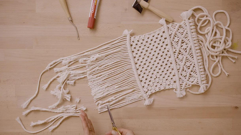 Use the fringe as a reference and cut the rest at the same height.