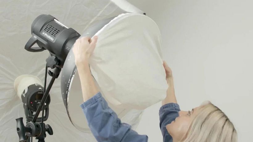 Using a diffuser sock will soften the light further.