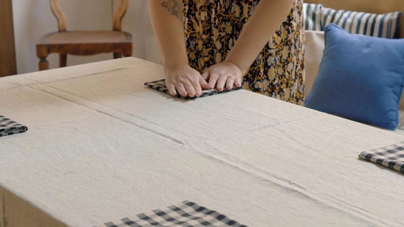 Lay out the checkered napkins.