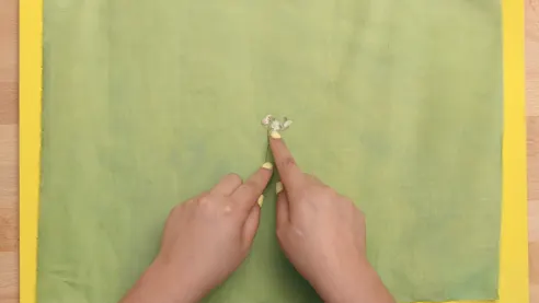 Mark the center using a plant
