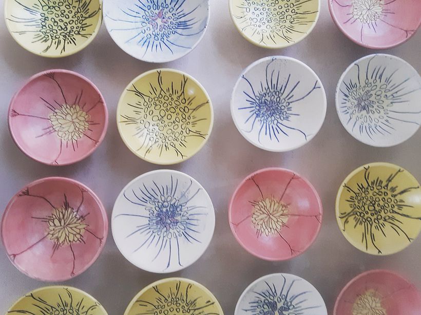 This is a series of small dishes made in homage to desert wildflowers. (globe mallow, desert marigold, and prickle poppy)