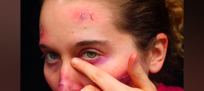 Adding red and purple to the eyes and under eyes.