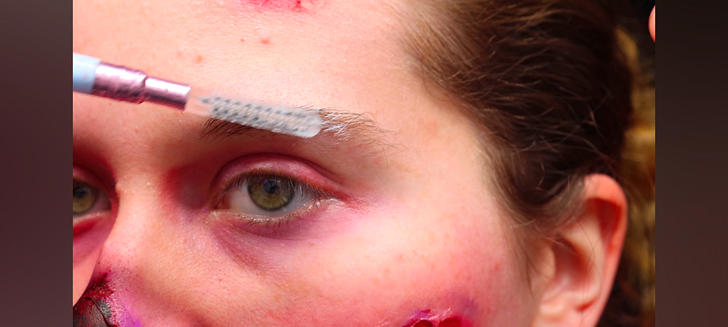 Adding white to the eyebrows and eyelashes.
