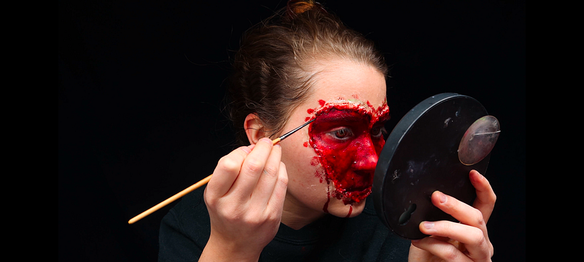 Adding dripping fake blood.