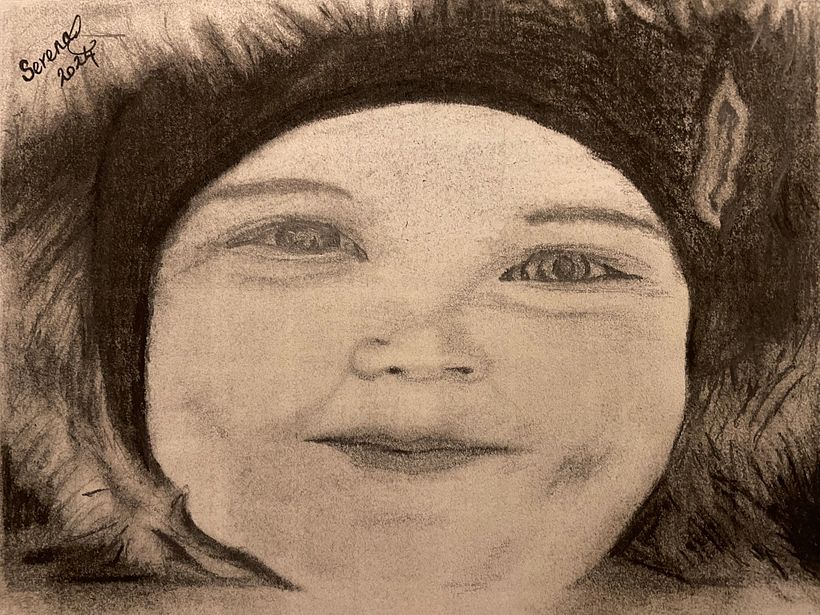 Completed drawing of Toby in charcoal 