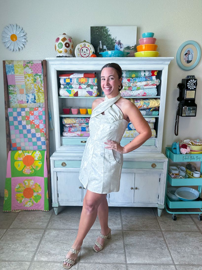 The romper has an adjustable halter neck and POCKETS!