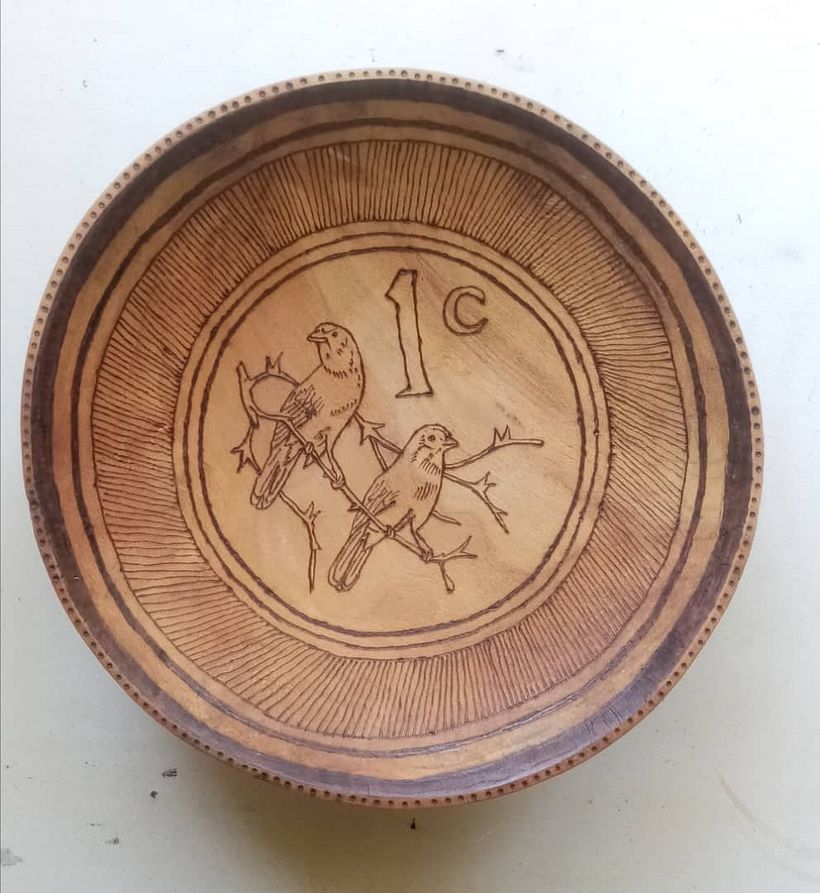 A wooden bowl. I have no idea what wood it is.