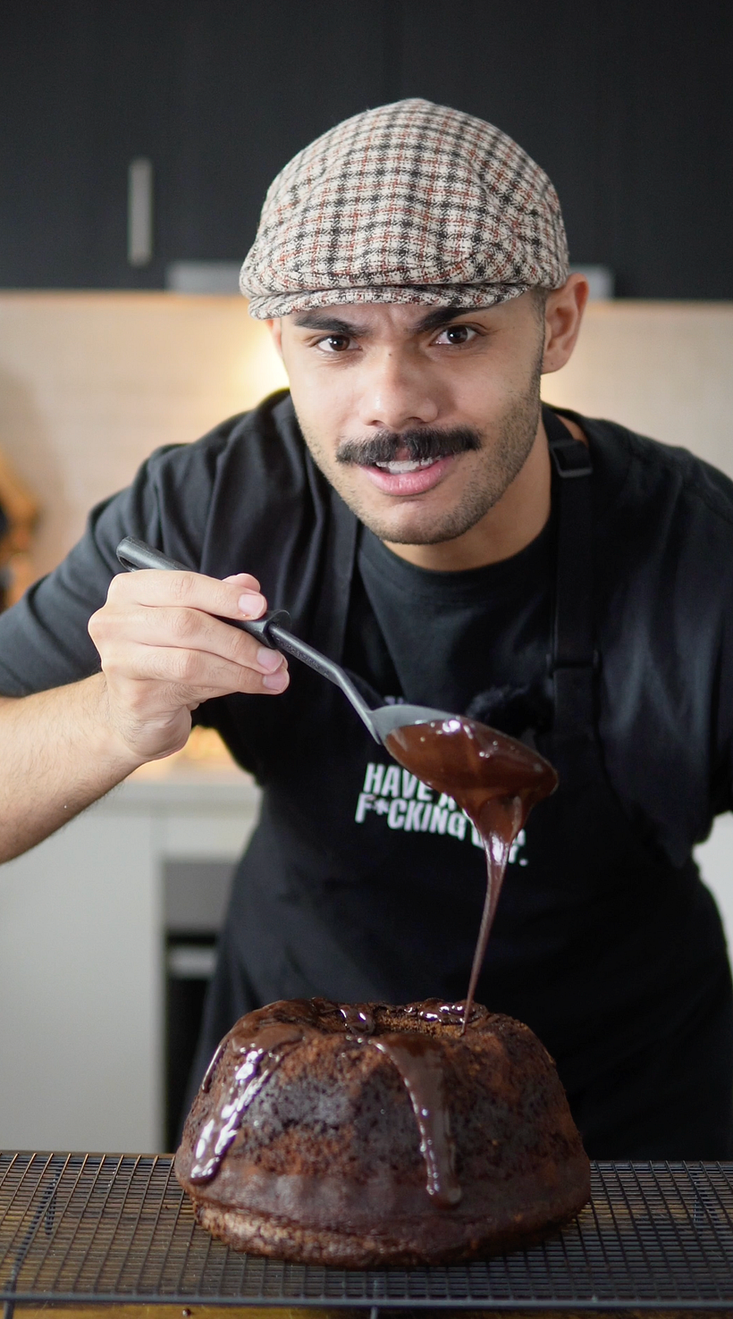 Adding the chocolate to a baked cake