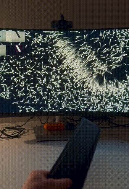 web camera is pointing down at the table, and particles are repelled from the object