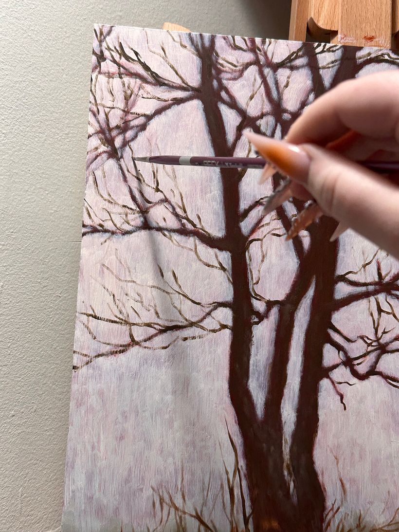 Adding final touches, including subtle highlights in the tree branches & tree trunk