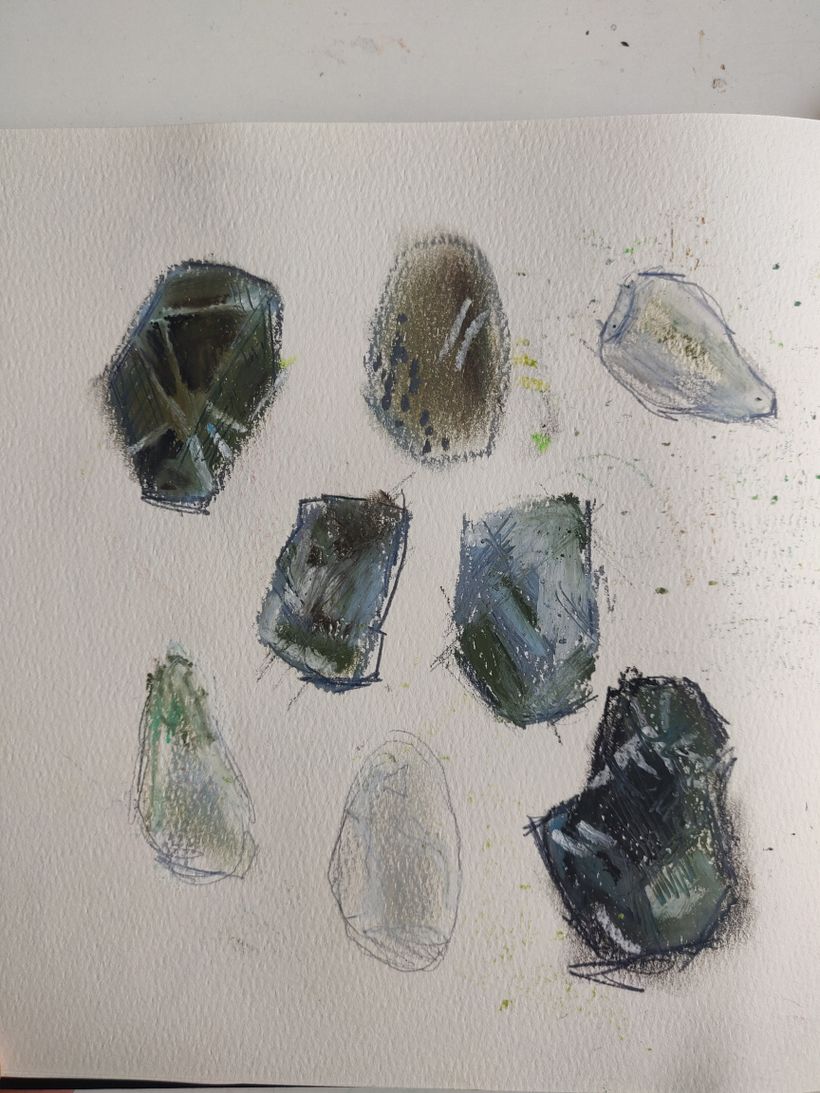 I took out my old oil pastels and tried to draw some rocks I found around the house.