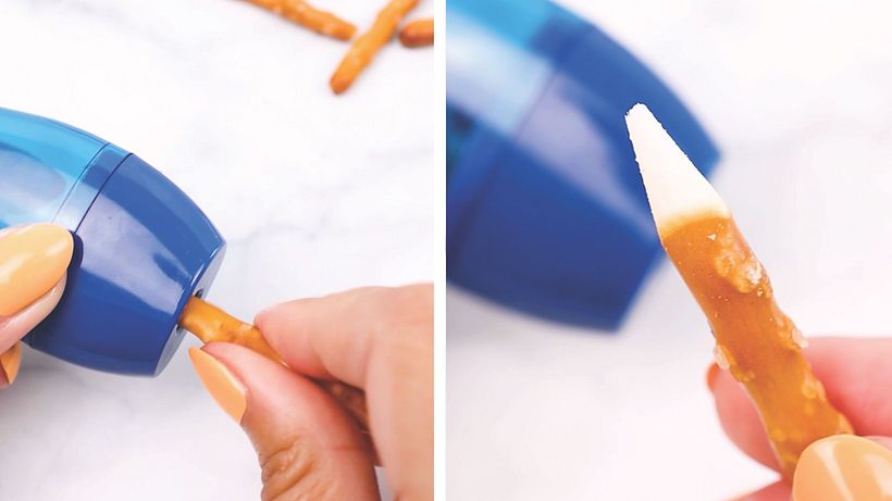 Carefully sharpening the pretzel sticks in a pencil sharpener that had never been used before. 