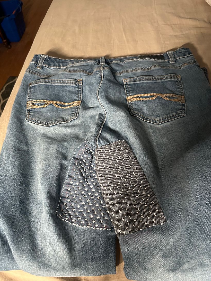 Finished (for now) project. Patch on right is over hole and is denim, patch on left is covering worn area. 