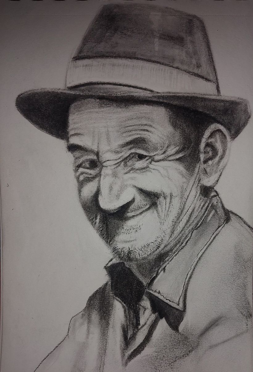 Dibujo que realice en carboncillo en agosto de este año. Es mi abuelo.