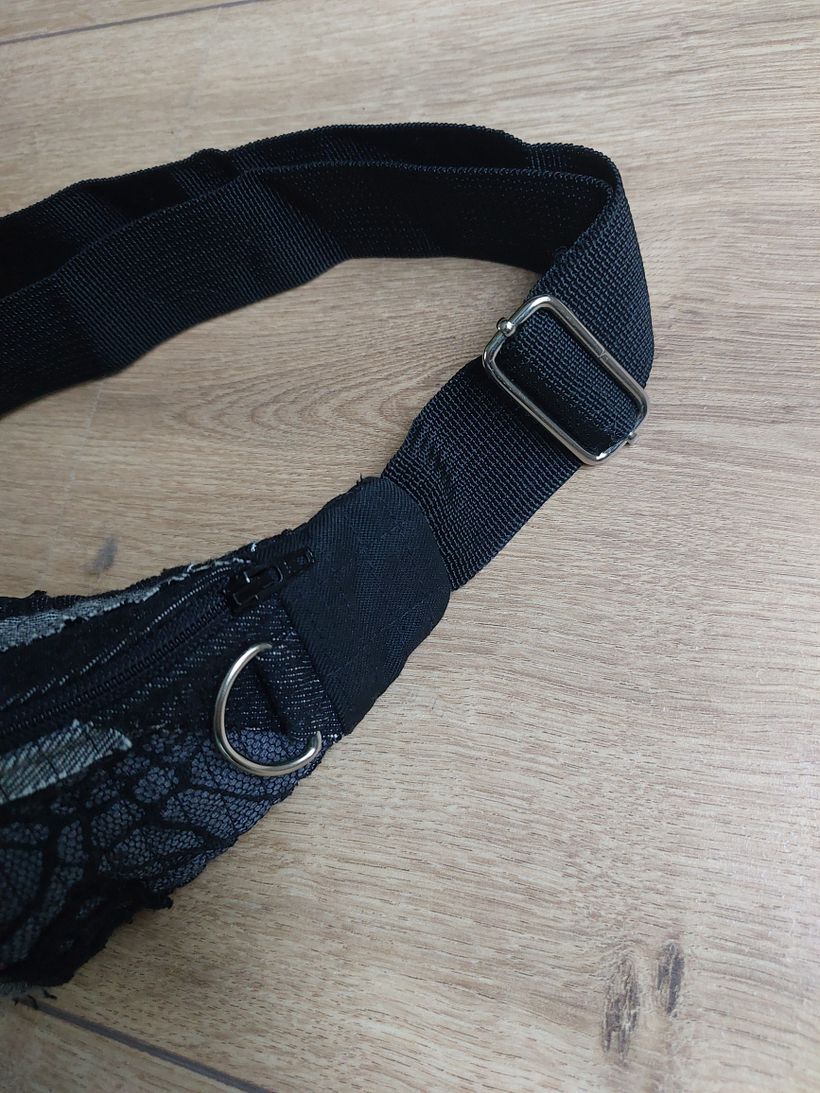 Nylon strap, slider buckle and D-ring recycled from an old laptop bag.
