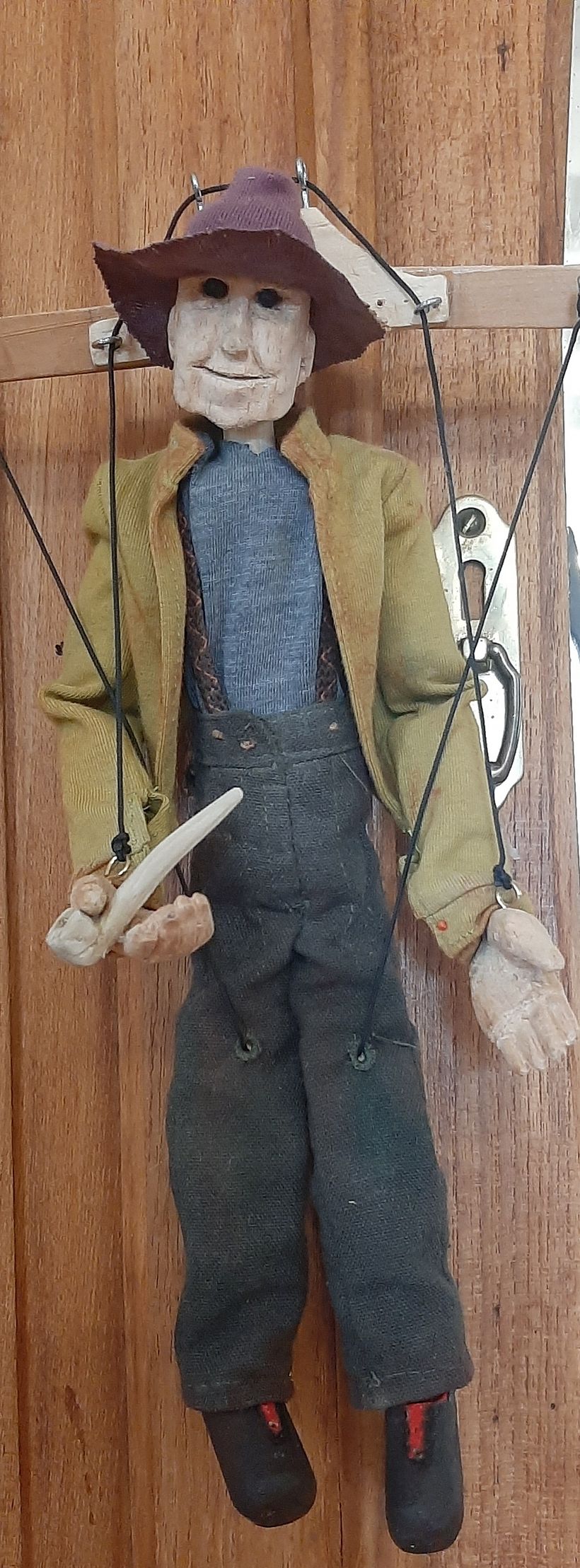 Van Hunk- Body, head and hands carved from wooden curtain rod. Arms legs and shoes carved from dowel rods