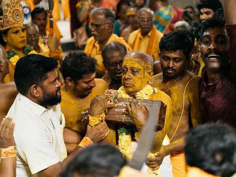 A deovtee carries turmeric in a sacred box called bandari petti.