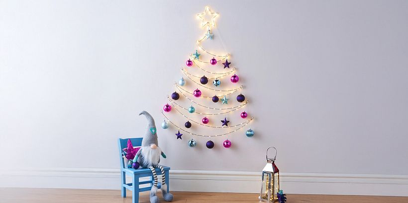 Árbol de luces en la pared